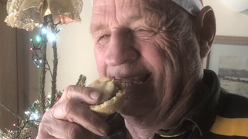 Jim Candy eating Christmas mince pie