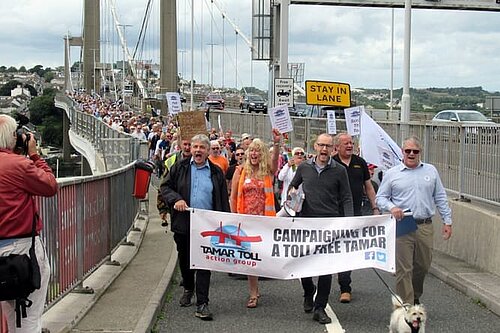 Cllr Colin Martin marches with Tamar Toll Action Group across the Tamar Bridge