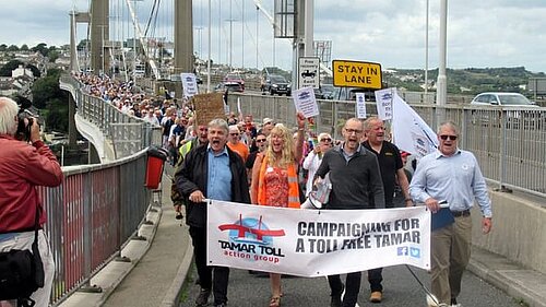 Cllr Colin Martin marches with Tamar Toll Action Group across the Tamar Bridge