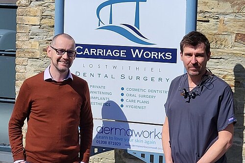 Cllr Colin Martin and Fin Bason at Lostwithiel Dental Surgery