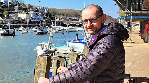 Colin Martin looking out over Looe Harbour